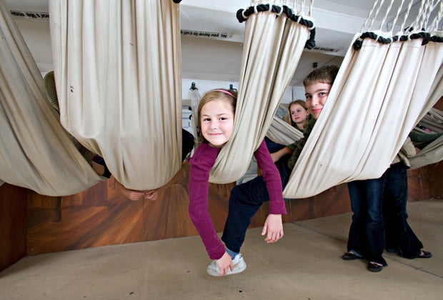 Photo of child in hammock on USS Constitution Museum.