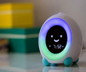 Kids will love the friendly light of the Mella Ready Rise clock. Photo from littlehippo.com.