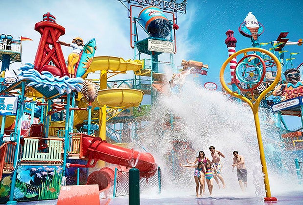 family playing int he water at Hershey's Water Works at Hershey Lodge