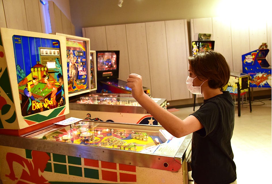 Rows and rows of pinball machines await at the newly opened High Score Pinball in the Westfield South Shore Mall.