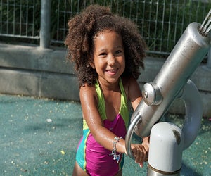 The Pier 25 splash pad in Hudson River Park is a guaranteed kid-pleaser. Photo by Jody Mercier