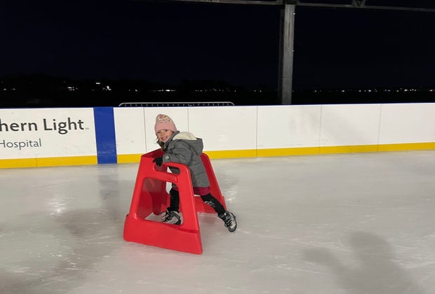 Image of child ice skating - Christmas in Maine