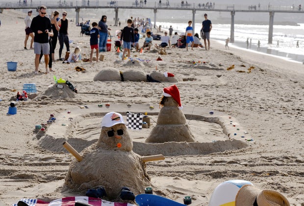 The sand snowman contest is one of the most unique holiday activities in LA