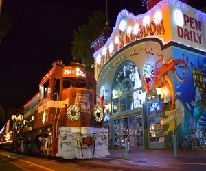 All aboard this vintage train full of holiday lights, treats, and songs. Photo courtesy of The Roaring Camp Railroad