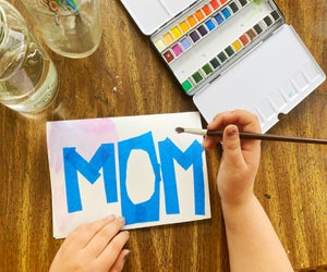 Use watercolors and painter's tape to make beautiful DIY Mother's Day cards at home.