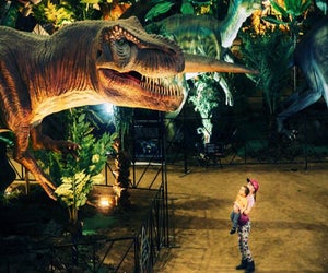 Kids get up close and personal with animatronic dinosaurs at Jurassic Quest. Photo courtesy of Jurassic Quest.h