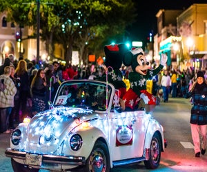 You never know who might show up at the Kissimmee Festival of Lights Parade.  Photo courtesy of the  parade
