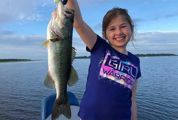 Girl Bass fishing on Lake Tohopekaliga