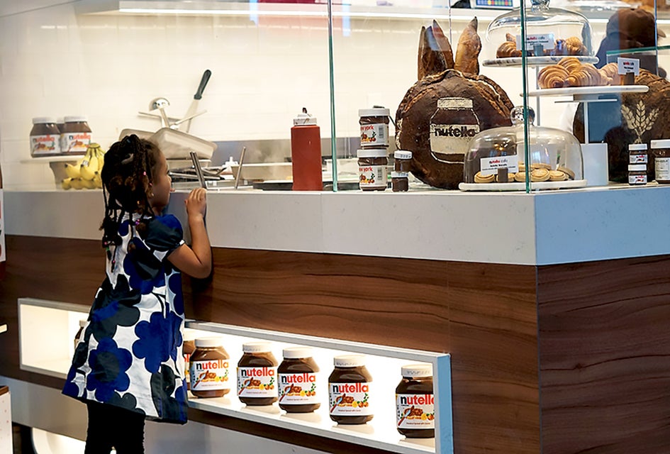 Marvel at the Nutella treats being prepared behind the counter. 
