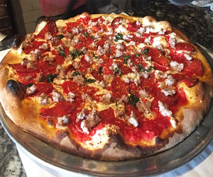 Dig in to a delicious pie at Salvatore's Coal Oven Pizzeria.
