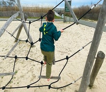 The new ropes course at Captree State Park features a spider-web structure. 