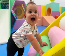 Little ones love  playing in the padded baby area at Jetsetter Kids Club. 