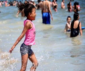 Enjoy the surf at Jones Beach, but be warned: The waves can get rough. Photo by ric shaw/CC BY 2.0