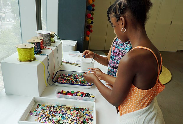 Birthday party in NYC at the Museum of Arts and Design in NYC sequins, buttons, and ribbons for the art project