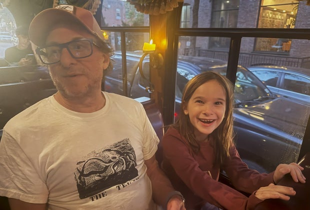 Madame Morbid's Trolley Tour: Father and daughter listening to ghost stories