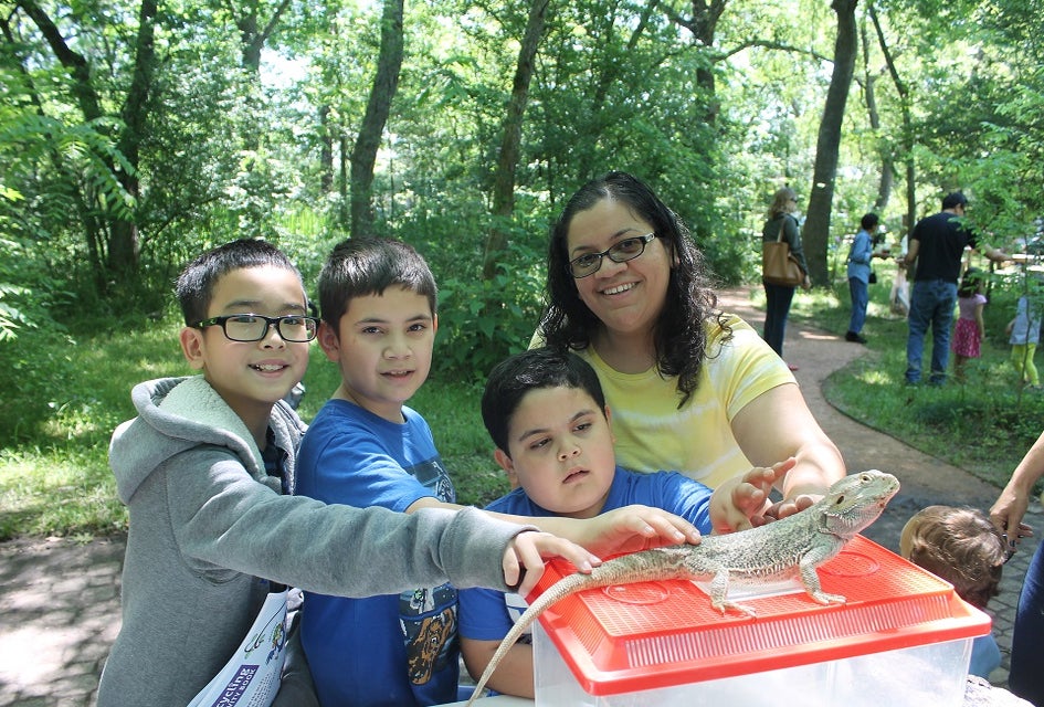Kids get up close and personal with animals at Meet the Animals./Photo courtesy of Nature Discovery Center.