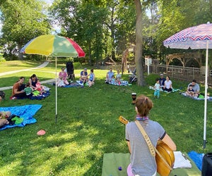 Get down in the great outdoors with Shake, Rattle & Roll's parent-and-me music classes. Photo courtesy of Shake, Rattle &  Roll