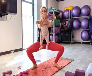 At The Motherhood Center, the Mom & Baby Yoga and Fitness class offers an opportunity for you to regain strength and flexibility while to bonding with your baby. Photo courtesy of the center