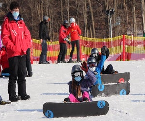 What better way to try out snowboarding than with a FREE beginner lesson at Mount Peter. Photo courtesy of the resort
