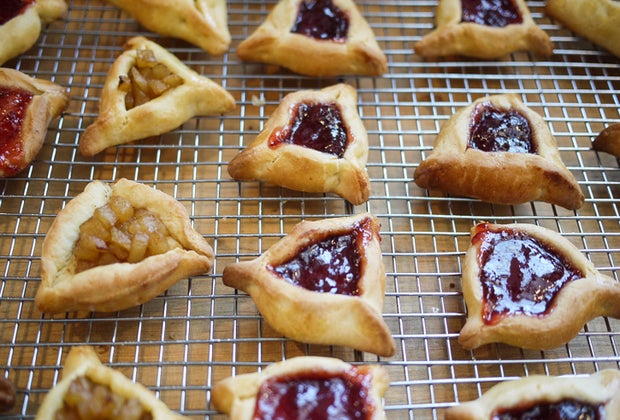 Homemade Purim Hamantaschen cookies cool on a rack