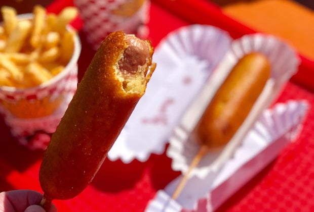 Photo of a crispy corn dog for National Hot Dog Day