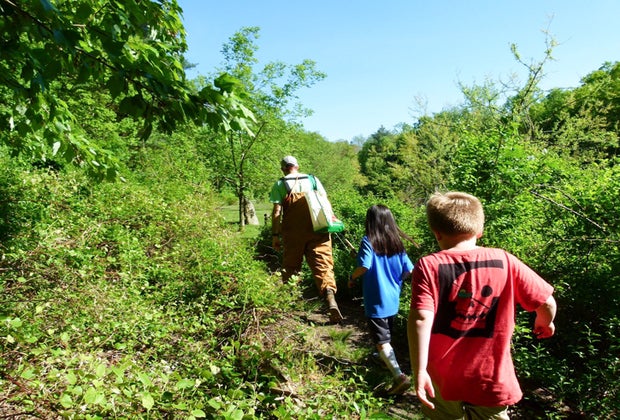 Photo of children walking on a trail at one of CT's afterschool programs.
