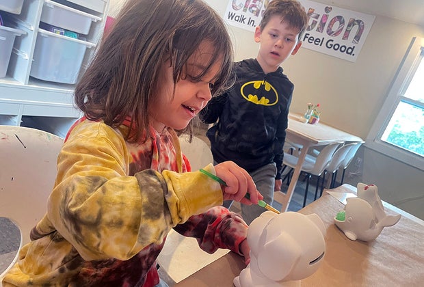 gina-jmassaro-two kids crafting at Claynation long isolqnd Things To Do on Mother's Day on Long Island Status message