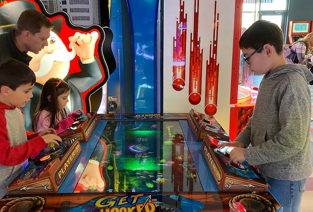 family playing Get Hooked at Fundaes