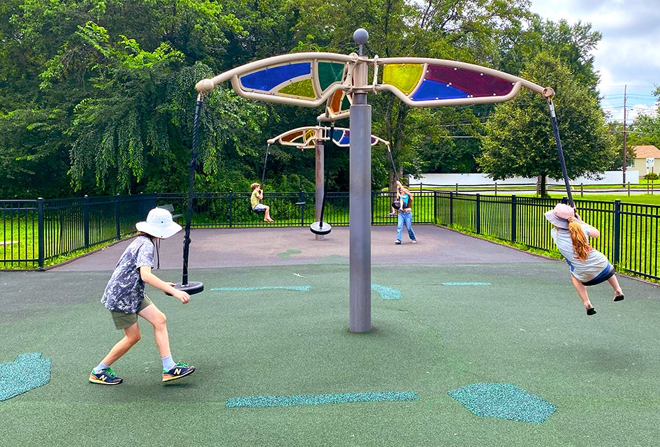 The unique carousel swing at Laurel Acres Park is a big hit with kids. 