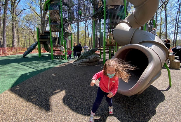 Toddler on a slide at Nomahegan Park playground