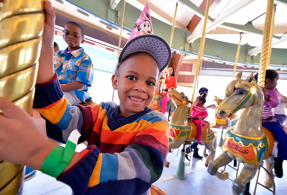 Celebrate at the Prospect Park Carousel with two hours of unlimited rides and a shady spot for a birthday picnic. Photo by Paul Martinka