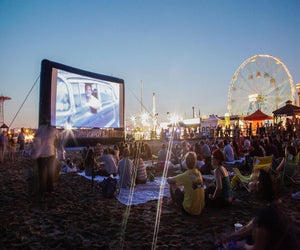 Enjoys a night with rides, food, and a film at Coney Island's Flicks on the Beach. Photo by Alexander Thompson/NYCGo