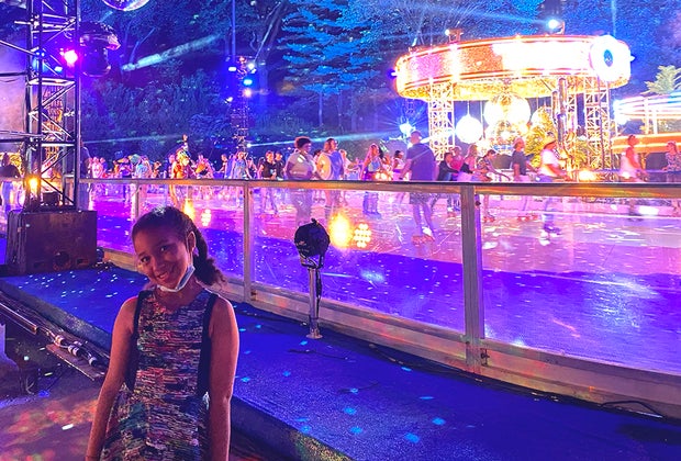 The DiscOasis girl poses outside the rink