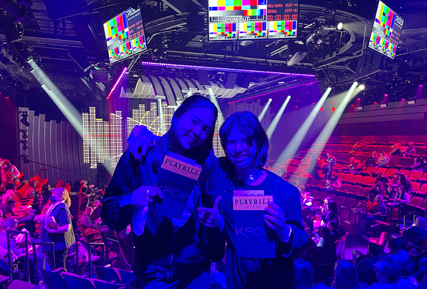 KPOP the musical: Girls posing with Playbills