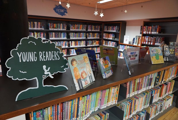 Things To Do in Little Italy with Kids: the children's section of books  at Mulberry Street Library