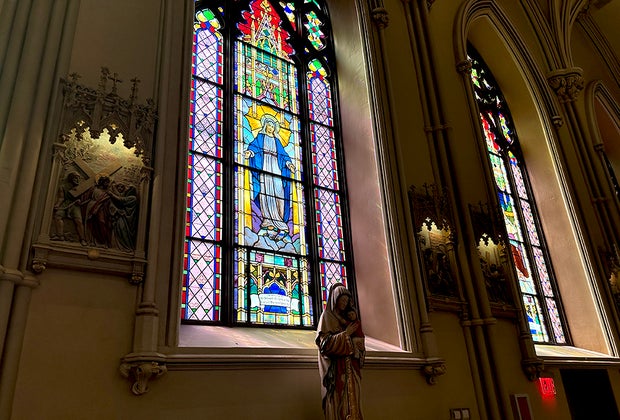 Things To Do in Little Italy with Kids: stained glass windows at Old St. Patrick's Basilica