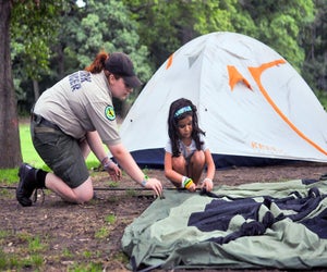 Urban Park Rangers bring tents—and pitch them—for FREE family campouts in NYC parks. Photo courtesy of NYC Parks