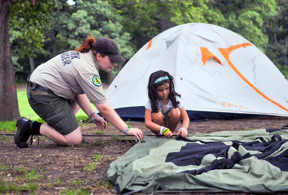 Urban Park Rangers bring tents—and pitch them—for FREE family campouts in NYC parks. Photo courtesy of NYC Parks
