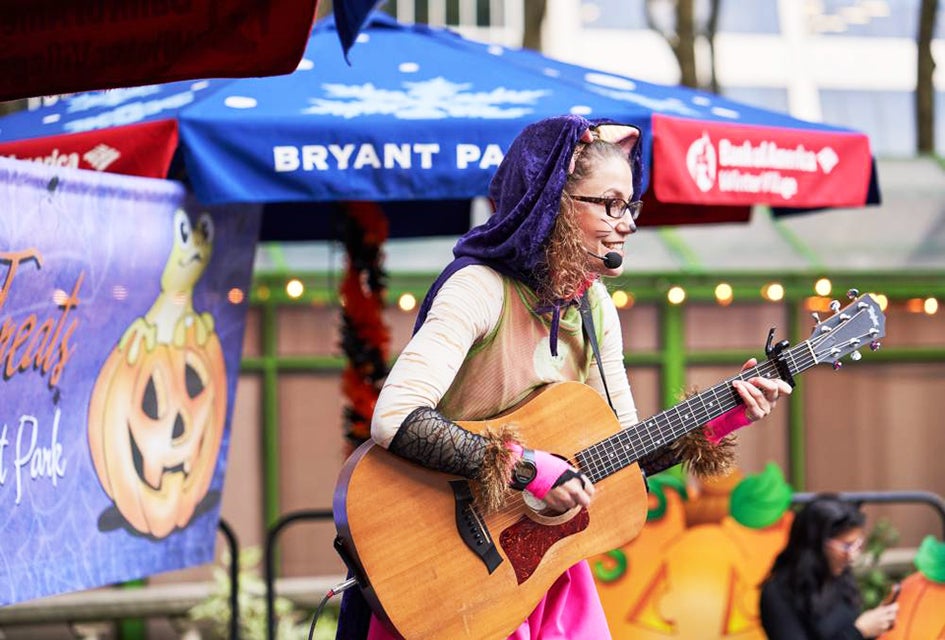 Join the Halloween party at Bryant Park to enjoy eerie magic tricks, face painting, arts & crafts, and spooky stories. Photo by Angelito Jusay