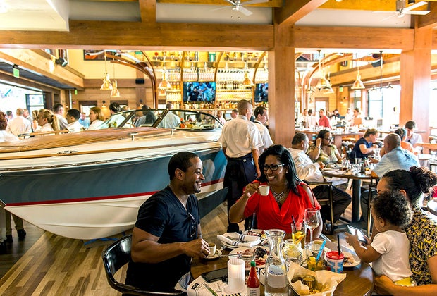 Best Things To Do and See in Disney Springs With Kids: Enjoy waterfront dining with live entertainment at The Boathouse