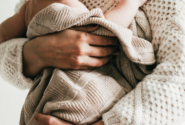 Hold a crying baby close