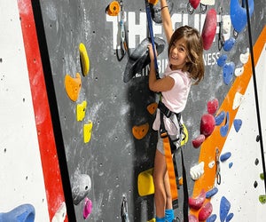 The climbing wall at The Cliffs at Callowhill challenges kids to climb to new heights. 