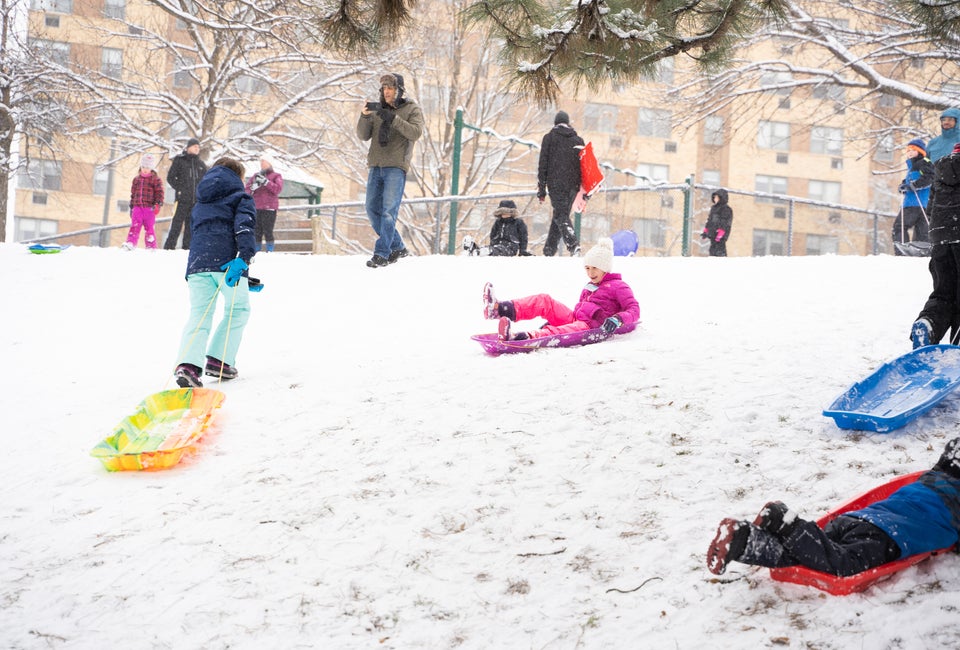 Kids enjoy sledding on a hill off Kelly Drive. Photo courtesy of Philadelphia Parks and Recreation
