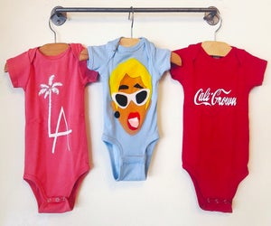 Outfit the baby in California cool apparel. Photo courtesy of La La Ling