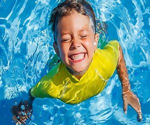 Kids that are happy in the water are kids that are safe in the water. Photo courtesy of SwimRight Academy