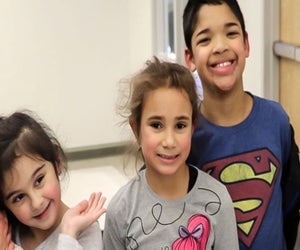 ASL classes can foster early communication with your baby. Photo courtesy of the American School for the Deaf