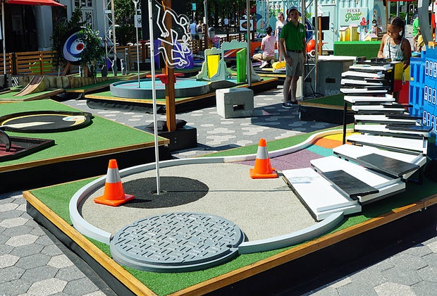 Pixar Putt little girl playing the Soul-themed hole