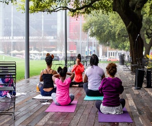 Yogis aged 10 and up can enjoy a special class that includes poetry being read aloud while performing yoga flows at Discovery Green. Photo courtesy of Sarah Nielson.