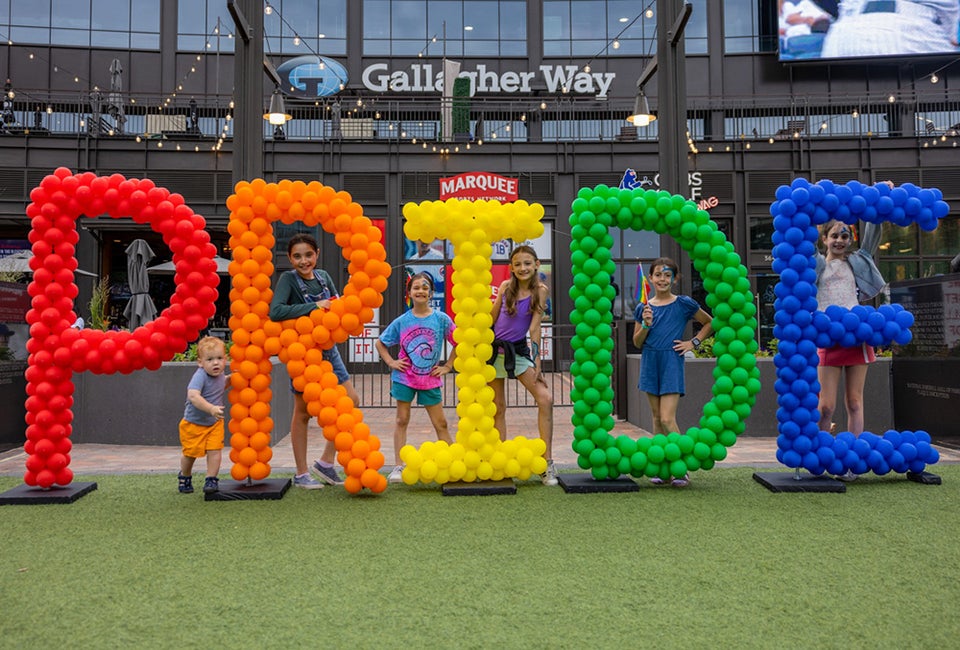 Kids smiling for Pride Month!  Photo courtesy of Gallagher Way