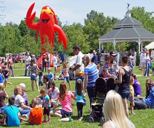 Mudbugs, live music, a kids zone, and crawfish racing make Rails and Tails a family-friendly event you don't want to miss./Photo courtesy of Tomball Texan for Fun.